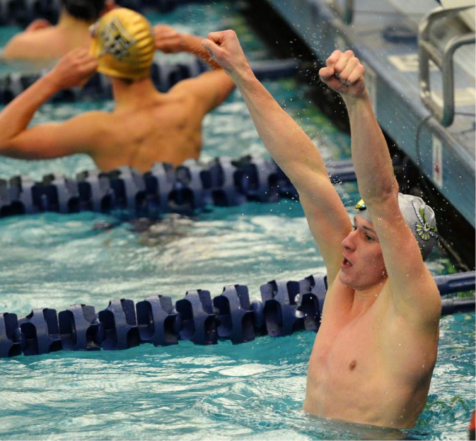 Steve Griffin  |  The Salt Lake Tribune
Karson Christensen, of Ridgeline High School, throws his fists in the air after winning the 50 free during the first day of the state 3A swimming championships at the BYU natatorium in Provo Friday February 10, 2017.