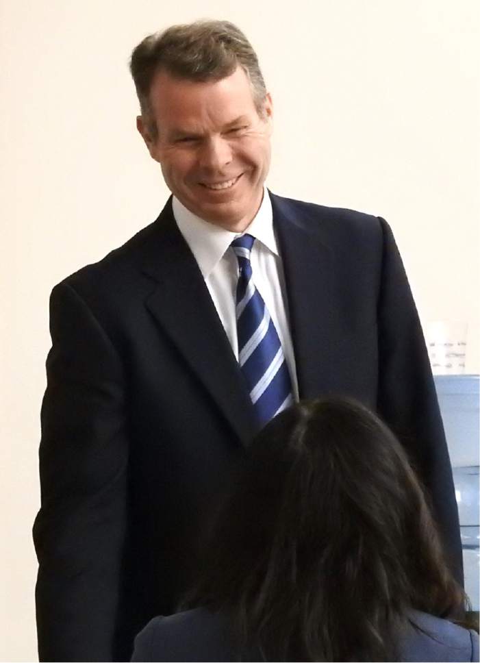 Rick Egan  |  The Salt Lake Tribune

John Swallow's jokes with Cara Tangaro from his defense team, during a recess in  his trial in Judge Elizabeth Hruby-Mills courtroom in Salt Lake City, Thursday, February 9, 2017.