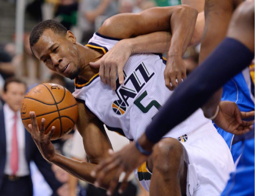 Steve Griffin / The Salt Lake Tribune


Utah Jazz guard Rodney Hood (5)hangs onto the ball as he tries to get to the basket during NBA game against there Dallas Mavericks at Vivint Smarthome Arena in Salt Lake City Wednesday November 2, 2016.