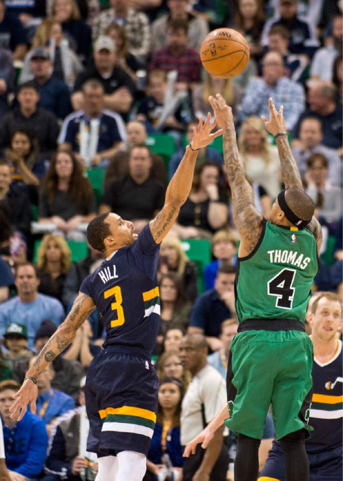Lennie Mahler  |  The Salt Lake Tribune

Isaiah Thomas shoots over George Hill in the first half of a game between the Utah Jazz and the Boston Celtics at Vivint Smart Home Arena on Saturday, Feb. 11, 2017.