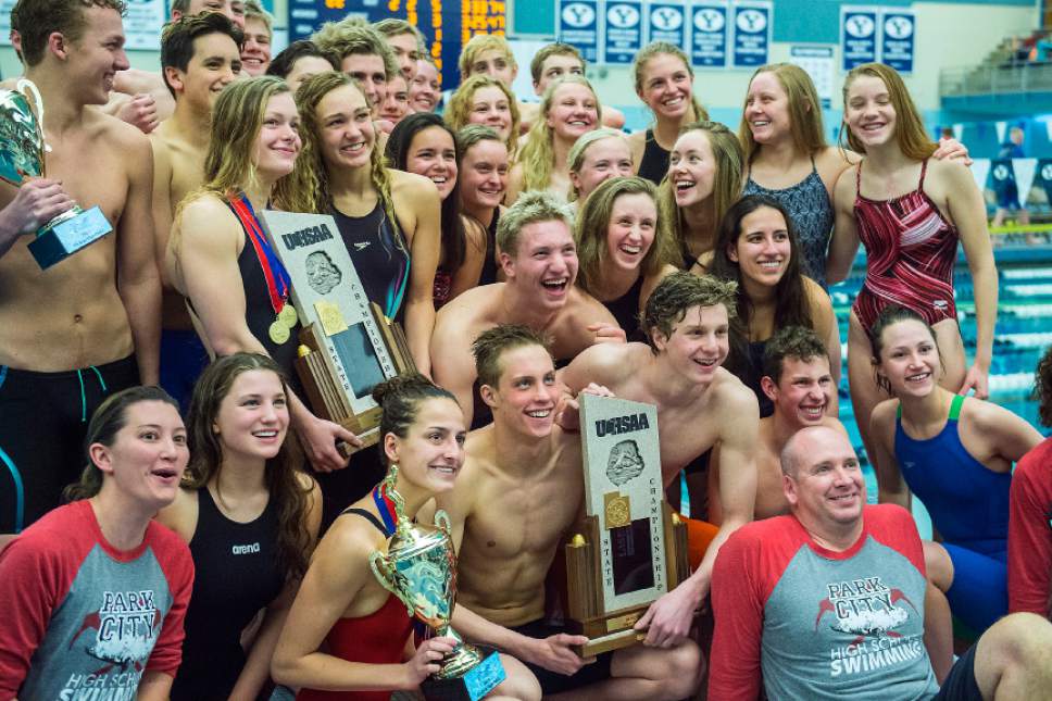 Chris Detrick  |  The Salt Lake Tribune
Members of the Park City swimming team pose for pictures after winning the 3A swimming tournament at Brigham Young University Saturday February 11, 2017.