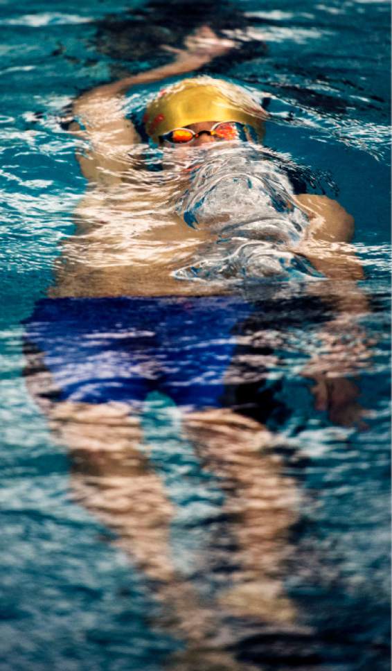 Steve Griffin  |  The Salt Lake Tribune


East High freshman Oliver Zhang exhales as he comes to the surface in his backstroke leg of the 200 IM during the first day of the state 4A swimming championships at the BYU natatorium in Provo Friday February 10, 2017.