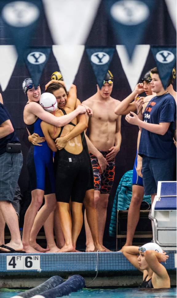 Steve Griffin  |  The Salt Lake Tribune


Members of the Corner Canyon girls 200 medley relay team celebrate their finish during the first day of the state 4A swimming championships at the BYU natatorium in Provo Friday February 10, 2017