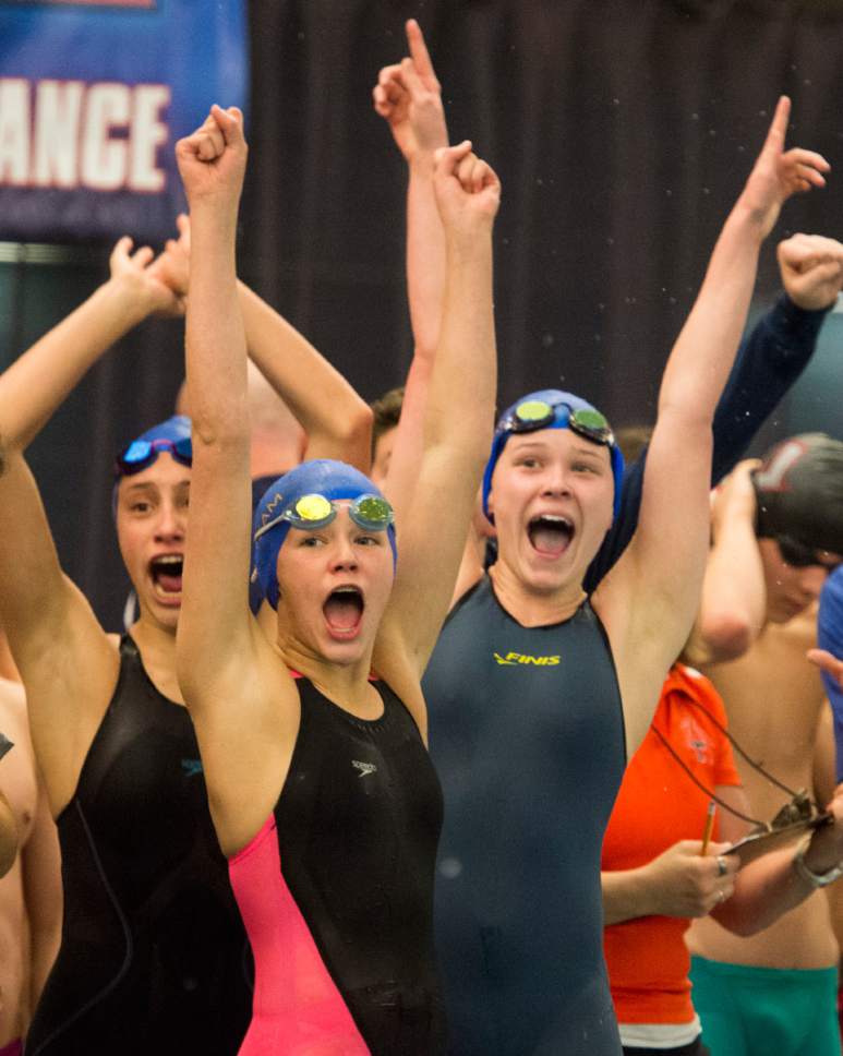 Rick Egan  |  The Salt Lake Tribune

Azalea Rostock, Annie Jacob, and Kate Hansen celebrate their first place finish for Timpview, in the Women;s 200 Yard Freestyle Relay, in the 4A state swimming finals at BYU, Saturday, February 11, 2017.