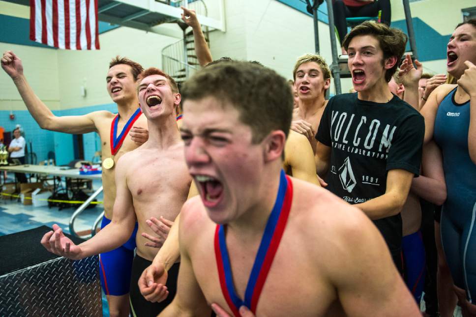 Chris Detrick  |  The Salt Lake Tribune
Members of the Lone Peak swimming team celebrate after winning the 5A swimming tournament at Brigham Young University Friday February 10, 2017.