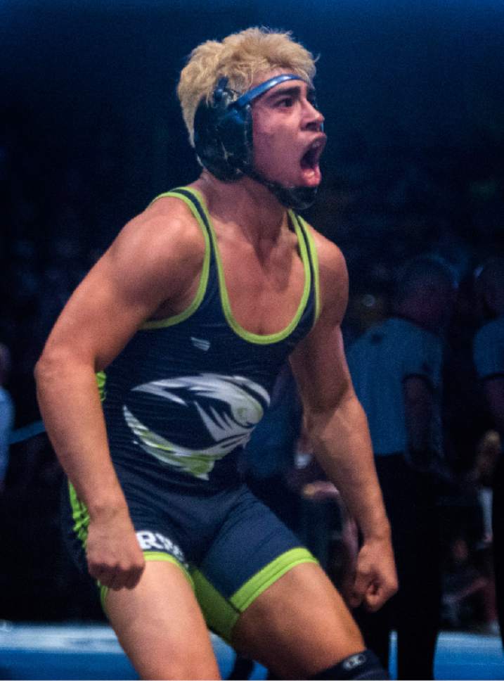 Rick Egan  |  The Salt Lake Tribune

Conner Wengreen of Ridgeline celebrates his victory over Bryken Jensen of Bear River in the 160 division, in the 3A state wrestling finals at UVU, Saturday, February 11, 2017.