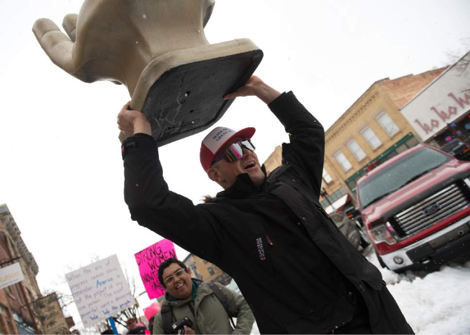 Leah Hogsten  |  The Salt Lake Tribune
"The hand is not to scale," said Casey Welch of Ogden, wearing a "Make Ogden Great Again" hat, who joined the Ogden march carrying a hand to represent the size of President Trump's hands. In conjunction with the Women's March on Washington, Ogden hosted the Northern Utah Unity Rally Saturday, January 21, 2017  at Ogden Union Station with a march to Washington Boulevard, ending at the Ogden City Municipal Building, 2549 Washington Blvd.