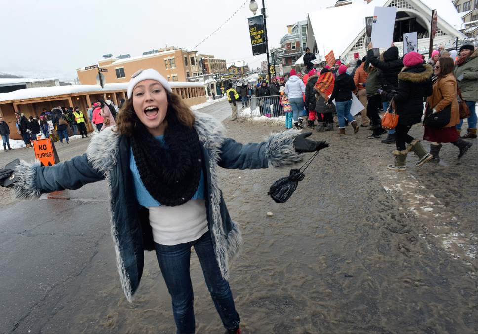 Scott Sommerdorf   |  The Salt Lake Tribune  
An energetic marcher cheered at the end of he Women's March down Main Street in Park City, Saturday, January 21, 2017.