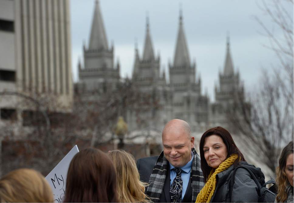 Scott Sommerdorf   |  The Salt Lake Tribune  
Joe Darger greeted others in City Creek Park prior joining with polygamists and their supporters and marching to the Capitol where they held a rally, Friday, February 10, 2017.