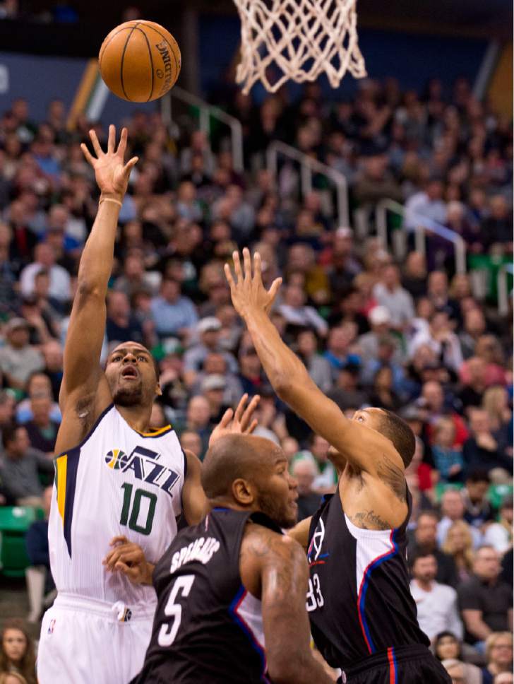 Lennie Mahler  |  The Salt Lake Tribune

Alec Burks shoots in the first half of a basketball game between the Utah Jazz and the LA Clippers at Vivint Smart Home Arena, Monday, Feb. 13, 2017.