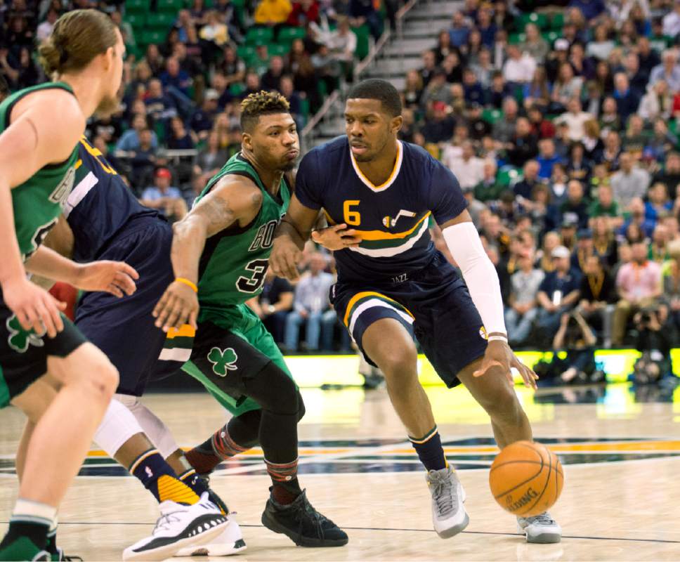 Lennie Mahler  |  The Salt Lake Tribune

Joe Johnson drives around Boston's Marcus Smart in the first half of a game between the Utah Jazz and the Boston Celtics at Vivint Smart Home Arena on Saturday, Feb. 11, 2017.