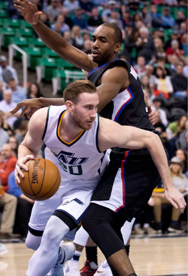 Lennie Mahler  |  The Salt Lake Tribune

Gordon Hayward dribbles around Luc Mbah a Moute in the first half of a game between the Utah Jazz and the LA Clippers at Vivint Smart Home Arena, Monday, Feb. 13, 2017.