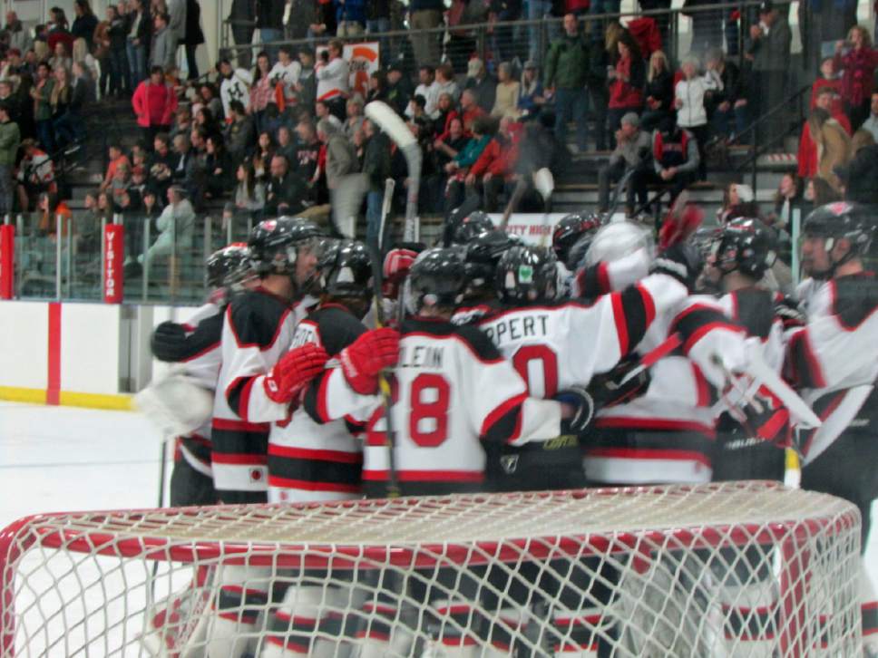 Tom Wharton  |  The Salt Lake Tribune

Park City celebrates its 4-0 win over Murray, which forced a deciding state high school hockey title game Wednesday.