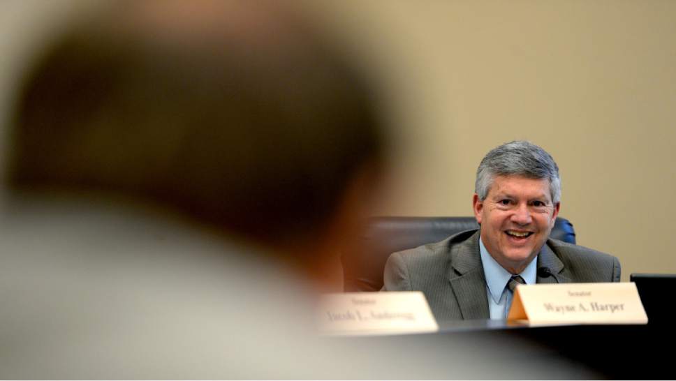 Steve Griffin  |  The Salt Lake Tribune


Sen.Wayne Harper, R-Taylorsville, answers a question from Sen. Jim Dabakis, D-Salt Lake City as members of the Senate Transportation, Public Utilities, Energy and Technology discuss SB198 in the Senate Building at the State Capitol in Salt Lake City Monday February 13, 2017