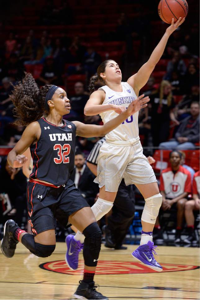 Scott Sommerdorf   |  The Salt Lake Tribune  
Washington Huskies guard Kelsey Plum (10) drives and scores over the defense of Utah Utes forward Tanaeya Boclair (32) during first half play. Plum scored 16 points in the first half. The Washington Huskies led Utah 45-25 at the half, Friday, February 3, 2017.