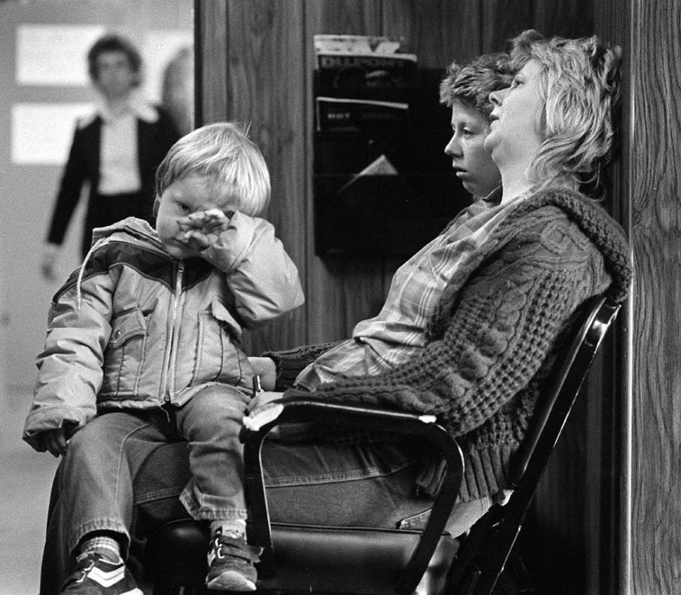 Al Hartmann  |  The Salt Lake Tribune
Exhaused family members of one of the 27 trapped coal miners in the Wilberg Mine wait to speak to a company repesentative at the Emery Mining Company office in Huntington December 23, 1984.