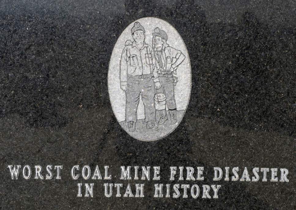 Al Hartmann  |  The Salt Lake Tribune
Detail from the United Miner Workers' monument to the 27 coal miners who died in the Dec. 19, 1984 Wilberg Mine firer, the state's worst disaster of the past 90 years. The monument is on the road from the Emery County town of Orangeville to the mine, which was in the distant hills.
