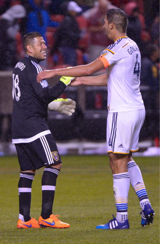 Leah Hogsten  |  The Salt Lake Tribune
Real Salt Lake goalkeeper Nick Rimando (18)is congratulated by Los Angeles Galaxy defender Omar Gonzalez (4) after the game. Real Salt Lake and LA Galaxy end the game 0-0 during their game at Rio Tinto Stadium, May 6, 2015.
