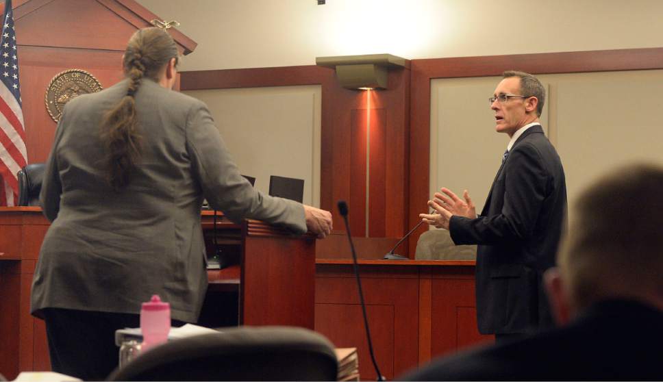 Al Hartmann  |  The Salt Lake Tribune
Mary Corporon, lawyer for Jeremy Johnson speaks to Judge Elizabeth Hruby-MIlls on immunity for her client before he will testify in John Swallow's public corruption trial in Salt Lake City Wed. Feb. 15. Prosecuter Fred Burmeister, right.