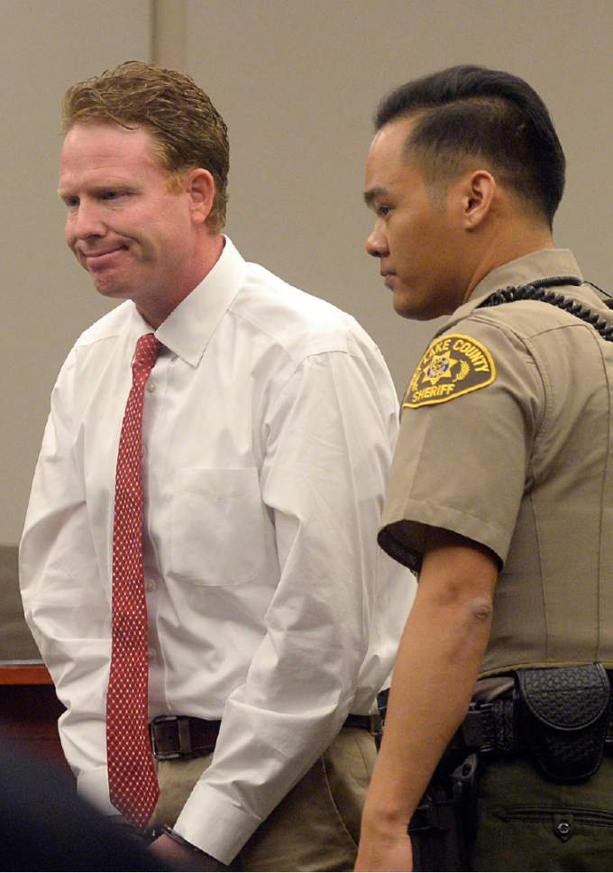 Al Hartmann  |  The Salt Lake Tribune
Jeremy Johnson takes the 5th amendment and declines to testify in John Swallow's public corruption trial in Salt Lake City Wednesday Feb. 15.  He was placed in contempt of court and lead out of the courtrom.