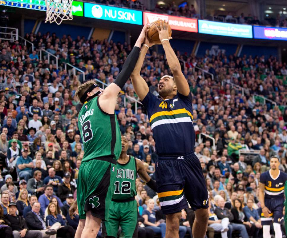 Lennie Mahler  |  The Salt Lake Tribune

Trey Lyles shoots as he is defended by Boston's Jonas Jerebko in the first half of a game between the Utah Jazz and the Boston Celtics at Vivint Smart Home Arena on Saturday, Feb. 11, 2017.