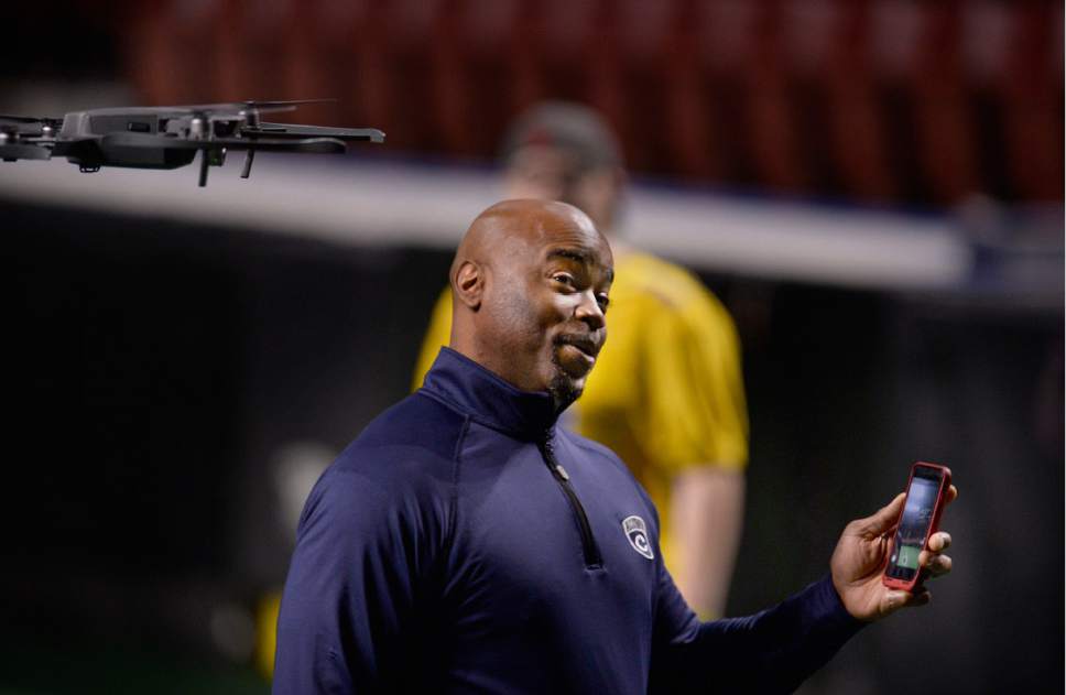 Scott Sommerdorf   |  The Salt Lake Tribune  
Ray Austin, Utah Screaming Eagles co-owner and former cornerback for the New York Jets and Chicago Bears videos a drone that will fly above the game and crowd during the games. The Screaming Eagles were in practice at The Maverick Center, Wednesday, February 15, 2017.