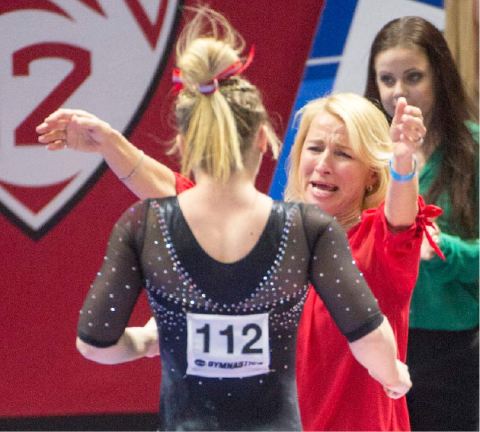 Rick Egan  |  The Salt Lake Tribune

Utah head coach Megan Marsden congratulates Maddy Stover after her balance beam routine, in the NCAA Regional Championships, at the Huntsman Center, Saturday, April 2, 2016.