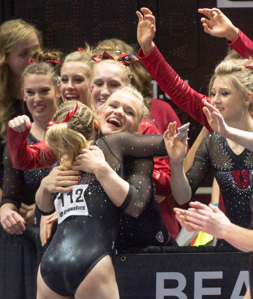 Rick Egan  |  The Salt Lake Tribune

Utah congratulates Maddy Stover after her balance beam routine, in the NCAA Regional Championships, at the Huntsman Center, Saturday, April 2, 2016.