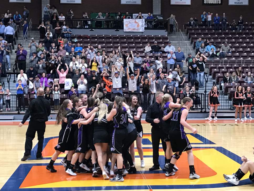 Trevor Phibbs  |  Salt Lake Tribune
The Tabiona girls' basketball team celebrates after defeating Monticello in Friday's Class 1A state semifinal at the Sevier Valley Center.