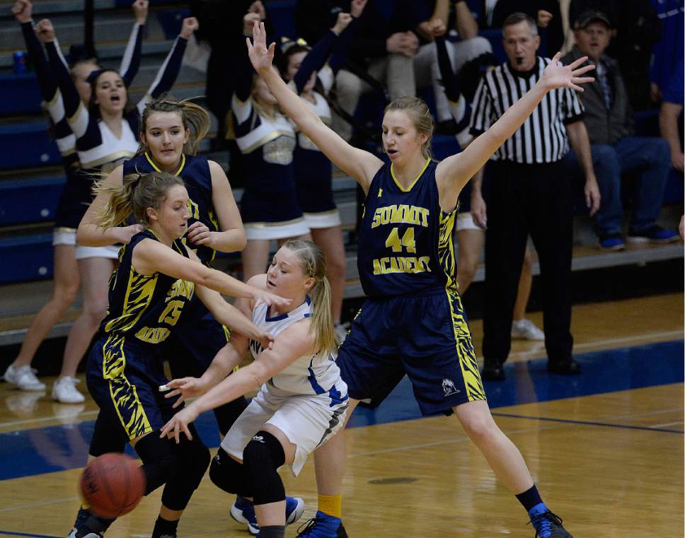 Scott Sommerdorf   |  The Salt Lake Tribune  
The Summit Academy defense thwarted this play during first half play, but Beaver beat Summit Academy 57-33, in a Class 2A girls' basketball playoff game played at Orem High, Friday, February 17, 2017.