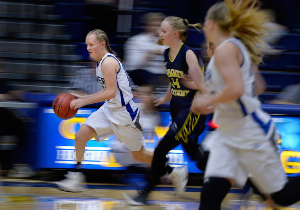Scott Sommerdorf   |  The Salt Lake Tribune  
Beaver's Lindsey Smith brings up the ball during second half play as Beaver beat Summit Academy 57-33, in a Class 2A girls' basketball playoff game played at Orem High, Friday, February 17, 2017.