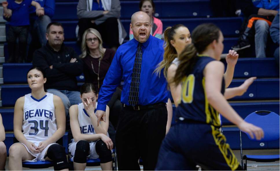 Scott Sommerdorf   |  The Salt Lake Tribune  
Beaver head coach Jonathan Marshall yells instructions as his team is involved in second half play. Beaver beat Summit Academy 57-33, in a Class 2A girls' basketball playoff game played at Orem High, Friday, February 17, 2017.