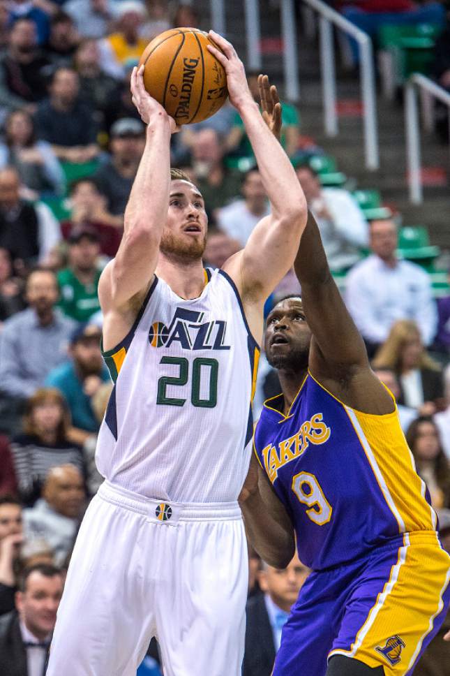 Chris Detrick  |  The Salt Lake Tribune
Utah Jazz forward Gordon Hayward (20) shoots past Los Angeles Lakers forward Luol Deng (9) during the game at Vivint Smart Home Arena Thursday January 26, 2017.