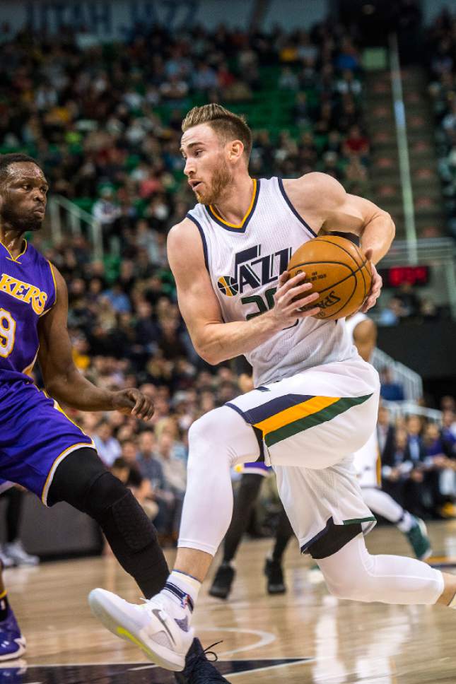 Chris Detrick  |  The Salt Lake Tribune
Utah Jazz forward Gordon Hayward (20) runs past Los Angeles Lakers forward Luol Deng (9) during the game at Vivint Smart Home Arena Thursday January 26, 2017.