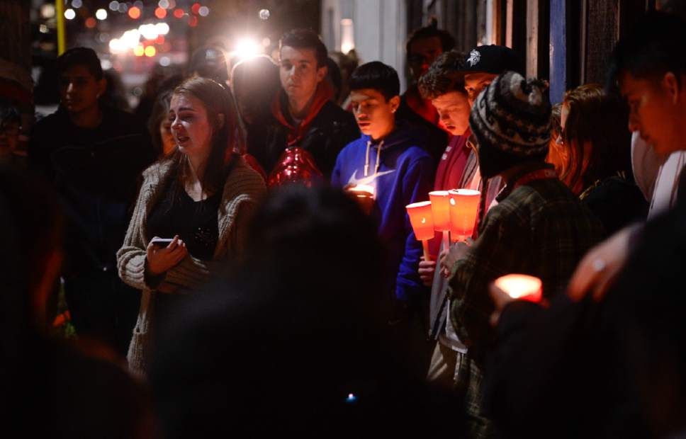 Francisco Kjolseth | The Salt Lake Tribune
Students from West High School gather for a candlelight vigil at the scene of a deadly car accident involving students from the school early Thursday morning. Two West High School seniors were killed and two others -- another student and a pregnant woman -- were seriously injured in the head-on collision north of the school.