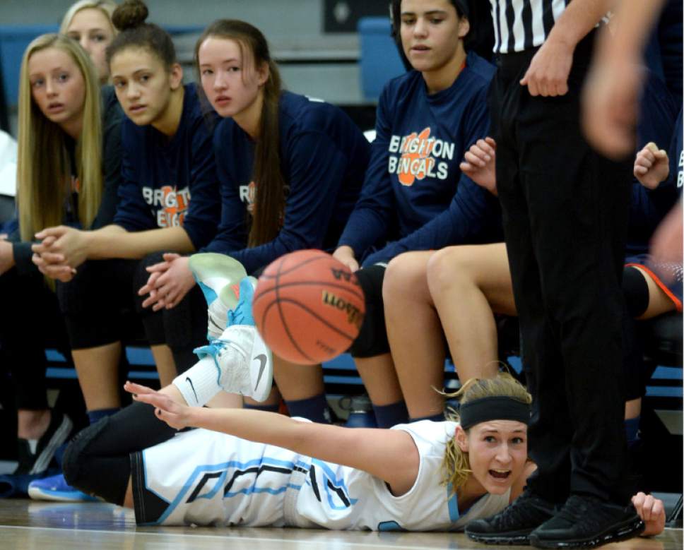 Steve Griffin  |  The Salt Lake Tribune


Sky View's Kaylee Carlsen slides across the court on her belly in front of the Brighton bench as she tries to save the ball during the girl's 5A basketball tournament at the SLCC gym in Salt Lake City Monday February 20, 2017