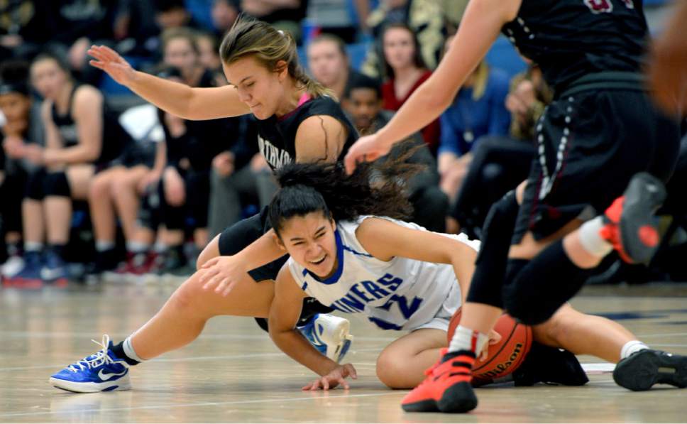 Steve Griffin  |  The Salt Lake Tribune


Bingham's Ameleya Angilau dives on the court for the ball in front of Northridge guard Jaden Auger during the girl's 5A basketball tournament between 5A Bingham and NorthRidge at the SLCC gym in Salt Lake City Monday February 20, 2017