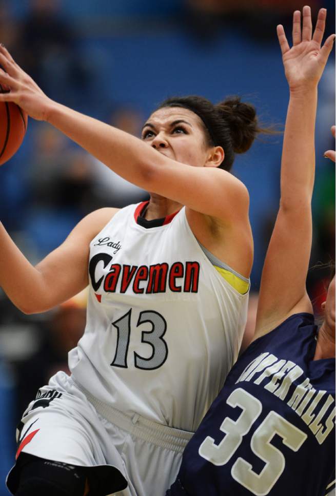 Steve Griffin  |  The Salt Lake Tribune

American Fork's Taylor Moeaki gets past Copper Hills guard Shirsten Wissinger during opening round of the girl's 5A basketball state tournament at SLCC in Salt Lake City, Monday, February 16, 2015.