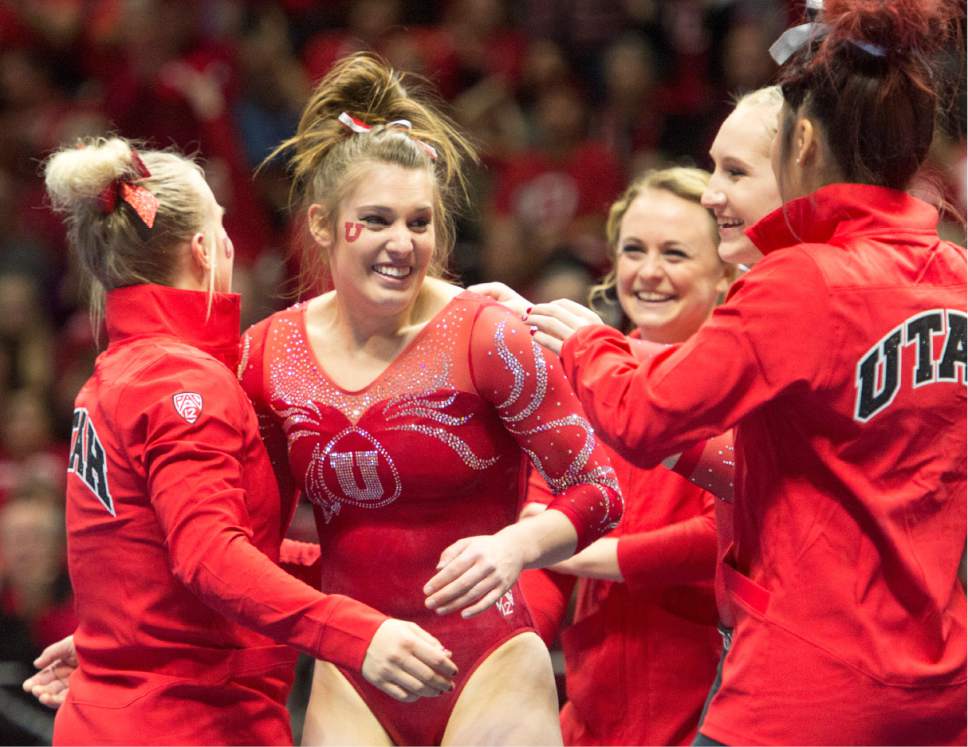 Rick Egan  |  The Salt Lake Tribune

Baely Rowe is greeted by her teammates after her performance on the beam for the Utes, in gymnastics action, Utah vs UCLA, at the Huntsman Center, Saturday, February 18, 2017.