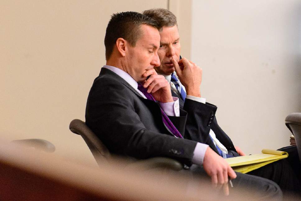 Trent Nelson  |  The Salt Lake Tribune
Defense attorney Brad Anderson and John Swallow confer as John Swallow's public-corruption trial resumes in Salt Lake City, Tuesday February 21, 2017.