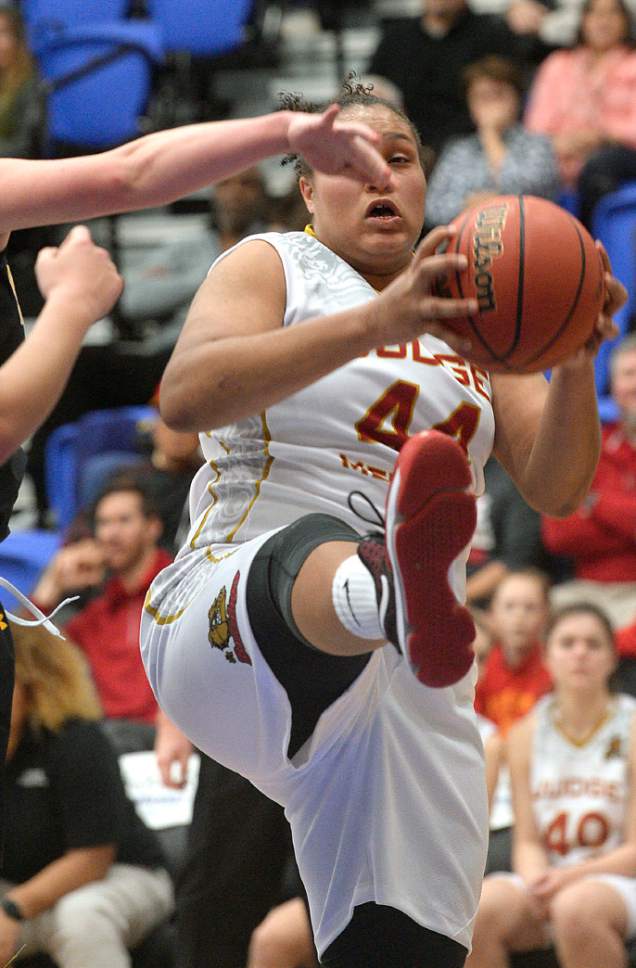 Al Hartmann  |  The Salt Lake Tribune
Judge High School's Mayree Ellis hauls down a rebound against  Wasatch High School Kenzie in first round action in the 2017 4A Girls' State Basketball Championships game Tuesday Feb. 21.  Judge went on to edge Wasatch High School 35-32 to enter the quarterfinals.