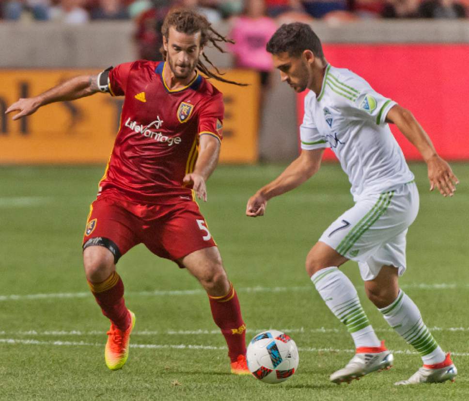 Michael Mangum  |  Special to the Tribune

Seattle Sounders midfielder Cristian Roldan (7) dribbles in front of Real Salt Lake midfielder Kyle Beckerman (5) during their U.S. Open Cup match at Rio Tinto Stadium in Sandy, UT on Tuesday, June 28th, 2016. The match ended in a 1-1 draw with Seattle advancing after winning in a penalty kick shootout.