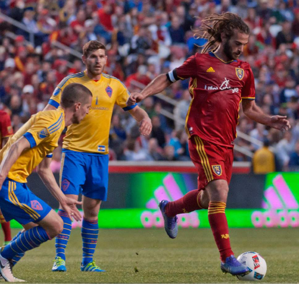 Michael Mangum  |  Special to the Tribune

Real Salt Lake midfielder Kyle Beckerman (5) dribbles away from traffic during their match against the Colorado Rapids at Rio Tinto Stadium in Sandy, UT on Saturday, April 9, 2016. RSL won 1-0.