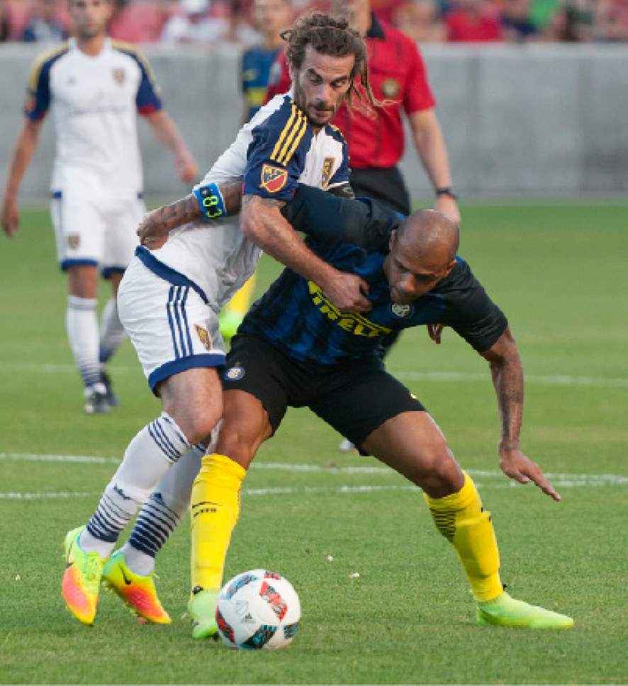 Michael Mangum  |  Special to the Tribune

Real Salt Lake midfielder Kyle Beckerman (5) and Inter Milan midfielder Felipe Melo (5) tossle for possession during their international friendly at Rio Tinto Stadium in Sandy, Utah on Tuesday, July 19th, 2016.
