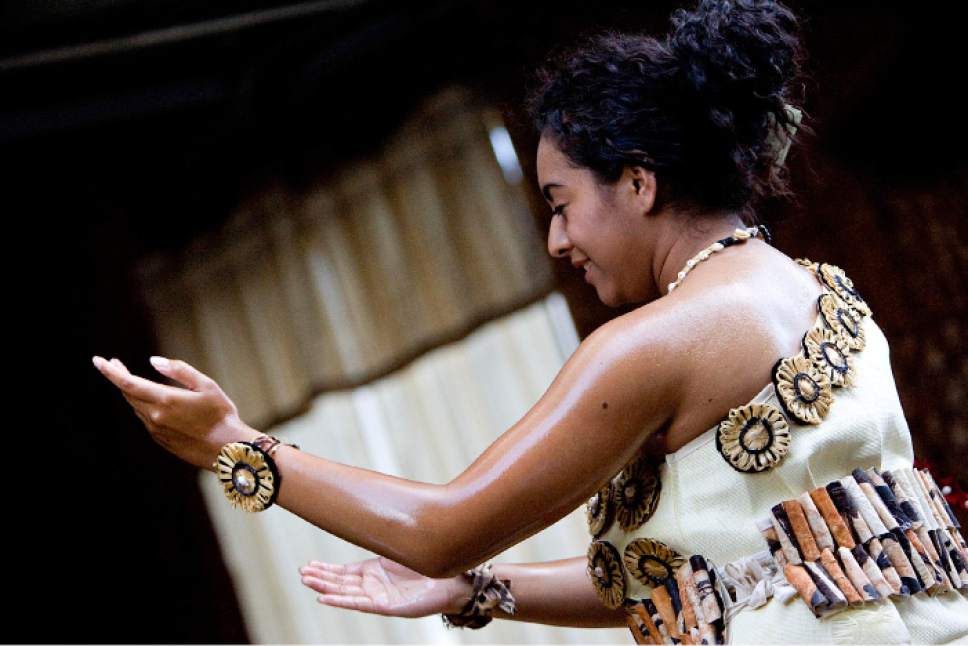 |  Tribune File Photo

Chelsey Uesi, 20, performs a Tauolunga, a traditional Tongan dance, for Halaevalu Mata'aho, the Queen Mother of Tonga, during an evening prayer and celebration at a home in West Valley City, Utah, on Wednesday, August 3, 2011.