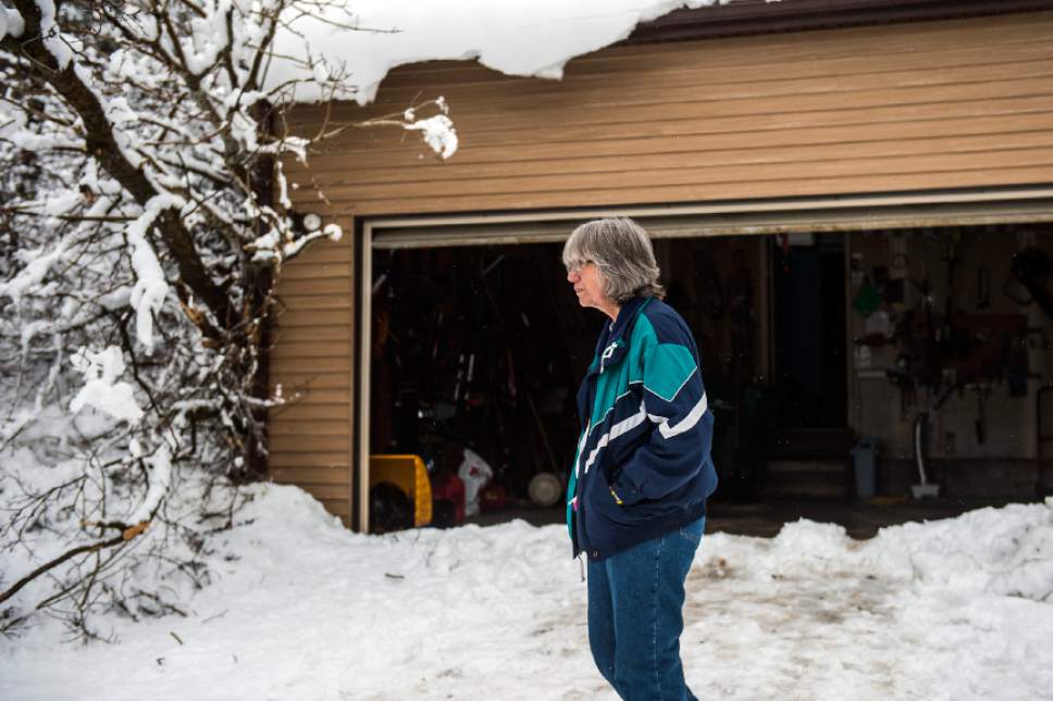 Chris Detrick  |  The Salt Lake Tribune
Carolyn McGrath looks at the damage caused from a 150 foot-wide mudslide at her home in Eden Wednesday February 22, 2017.
