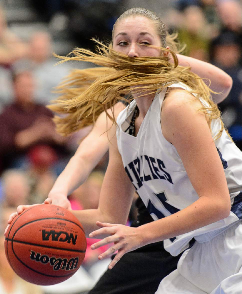 Trent Nelson  |  The Salt Lake Tribune
Copper Hills's Emily Larsen (15) with the ball as Lone Peak faces Copper Hills in the 5A high school girls basketball state championships at Salt Lake Community College in Taylorsville, Wednesday February 22, 2017.
