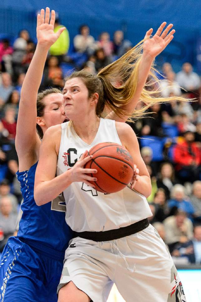 Trent Nelson  |  The Salt Lake Tribune
American Fork's Taylor Franson (41) defended by Fremont's Ivy Palfreyman (25) as Fremont faces American Fork in the 5A high school girls basketball state championships at Salt Lake Community College in Taylorsville, Wednesday February 22, 2017.