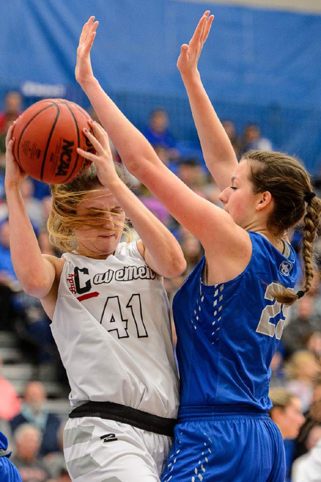 Trent Nelson  |  The Salt Lake Tribune
American Fork's Taylor Franson (41) defended by Fremont's Ivy Palfreyman (25) as Fremont faces American Fork in the 5A high school girls basketball state championships at Salt Lake Community College in Taylorsville, Wednesday February 22, 2017.