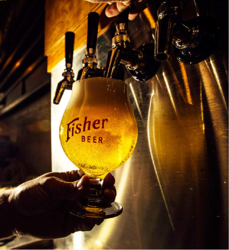 Steve Griffin  |  The Salt Lake Tribune


Steven Brown pours a draft beer at the new A. Fisher Brewing Co. in Salt Lake City on Friday, Feb. 17, 2017. The brewery, one of the oldest names in Utah beer history, makes a modern-day comeback this month.